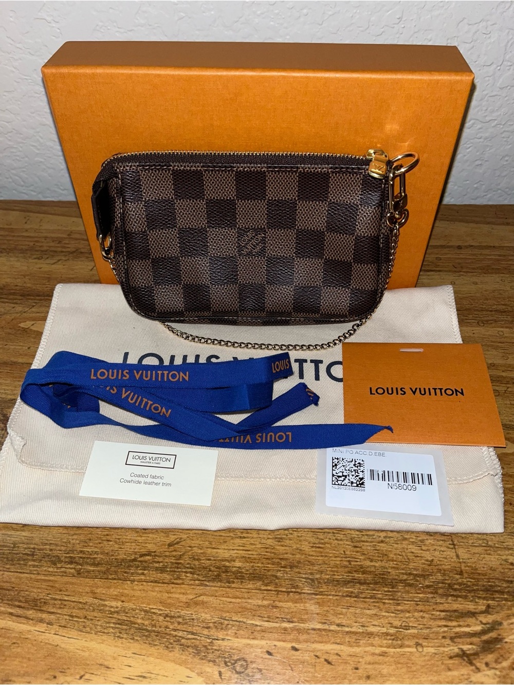 Louis Vuitton Damier Ebene Mini Pochette Accessoires